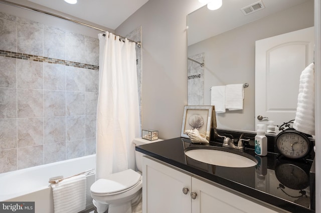 full bathroom with toilet, shower / tub combo, and vanity