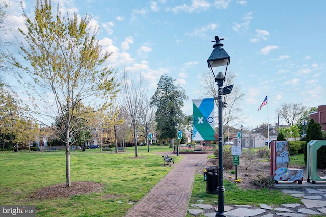 surrounding community featuring a yard