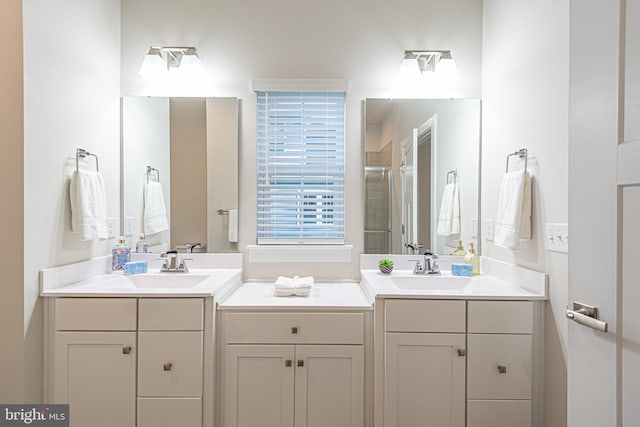 bathroom with vanity and an enclosed shower