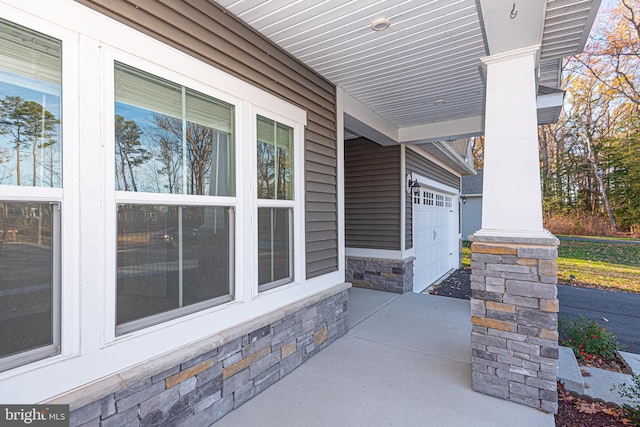 view of patio with a garage