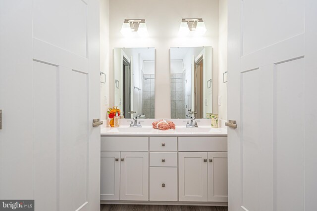 bathroom featuring hardwood / wood-style floors and vanity