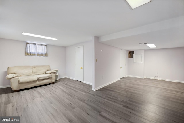 basement featuring hardwood / wood-style floors