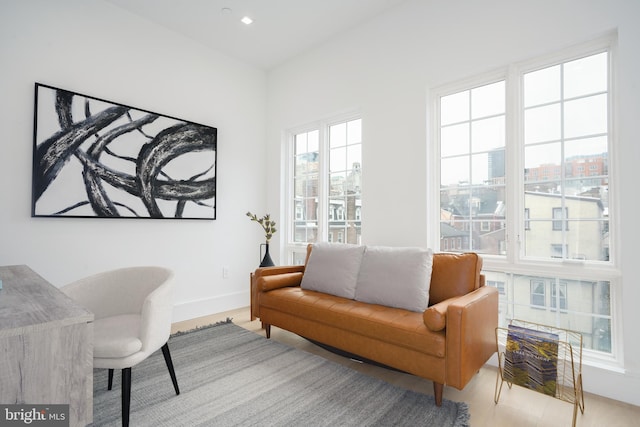 home office with light hardwood / wood-style floors