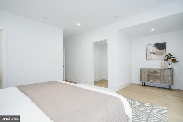 bedroom featuring hardwood / wood-style flooring