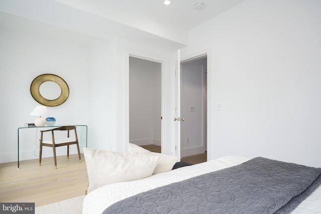 bedroom featuring hardwood / wood-style flooring