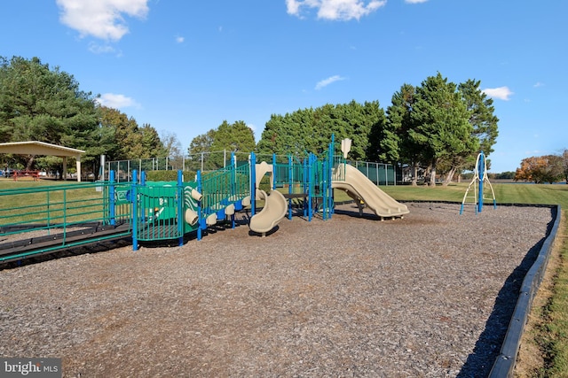 view of playground featuring a yard