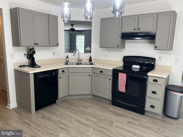 kitchen featuring sink, ceiling fan, gray cabinetry, and black appliances