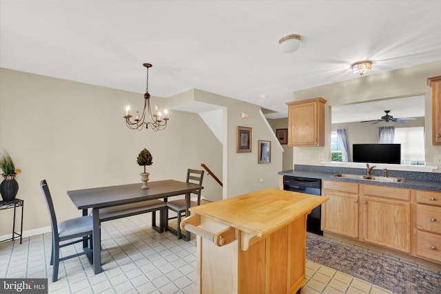 kitchen with light brown cabinets, sink, black dishwasher, kitchen peninsula, and ceiling fan with notable chandelier