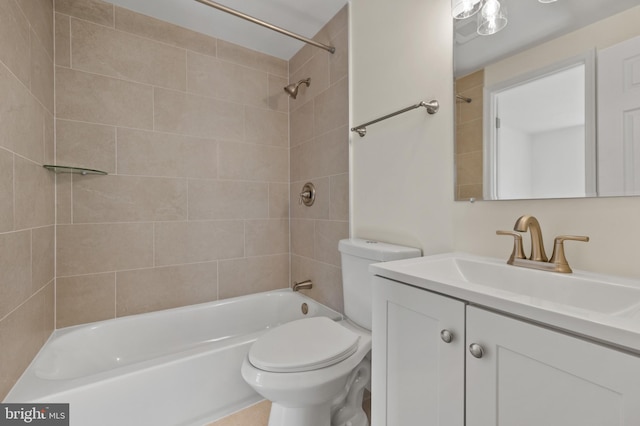 full bath featuring vanity, toilet, and shower / bathing tub combination