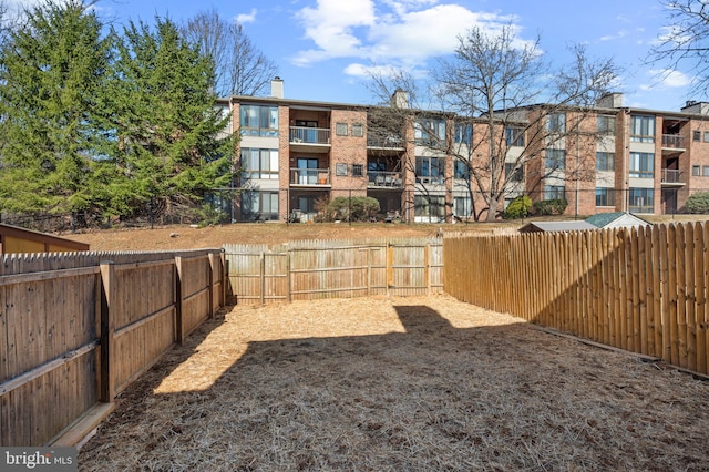 view of yard featuring a fenced backyard