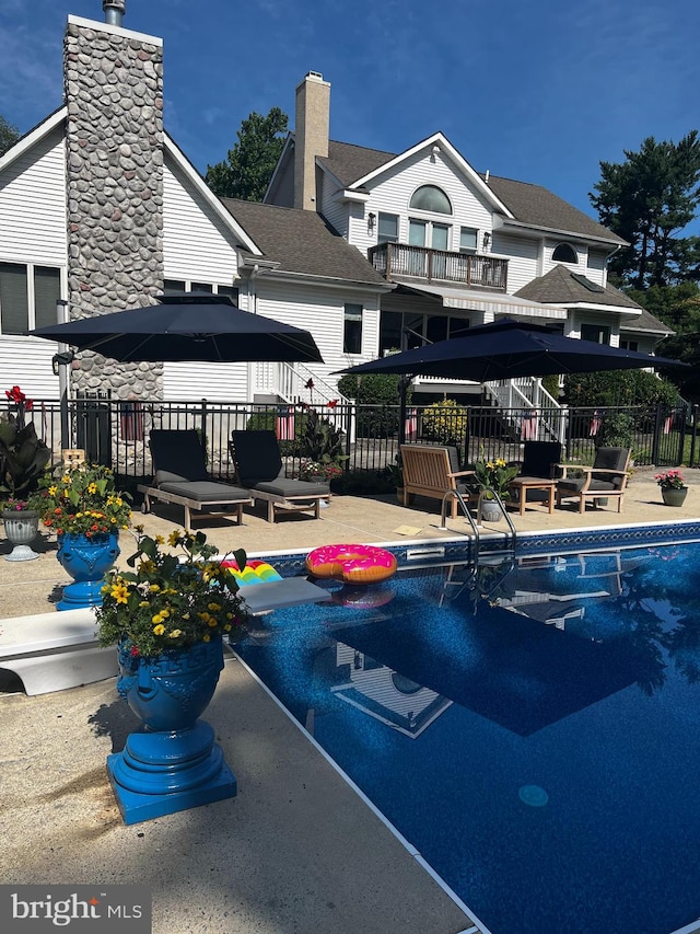 view of pool with a patio area