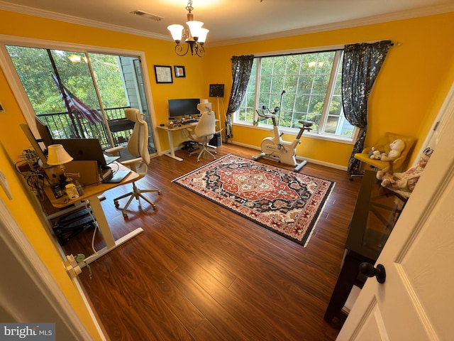 interior space with a chandelier, dark wood-type flooring, and ornamental molding