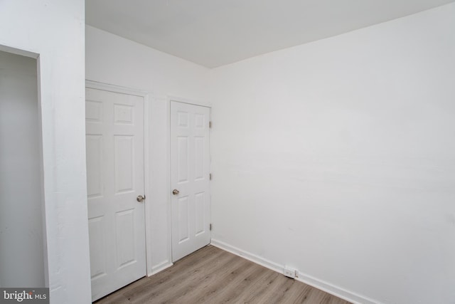 unfurnished bedroom featuring light hardwood / wood-style floors