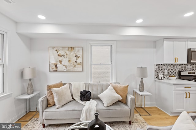 living room featuring light wood-type flooring