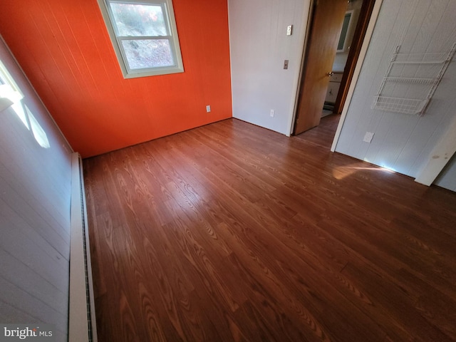 spare room featuring hardwood / wood-style floors