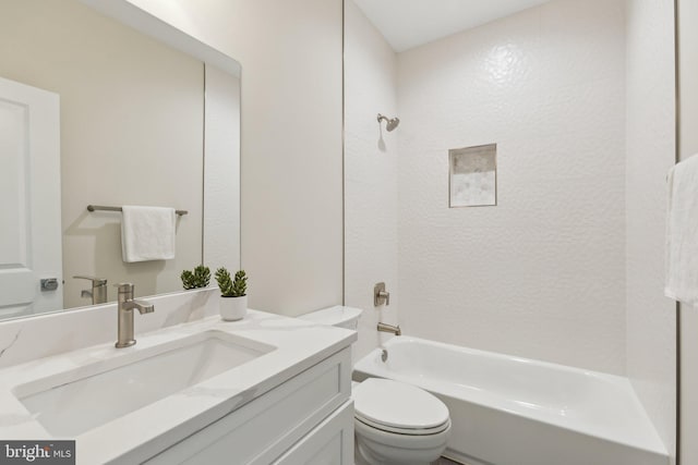 full bathroom with vanity, toilet, and tiled shower / bath