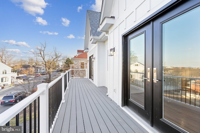 wooden terrace featuring french doors