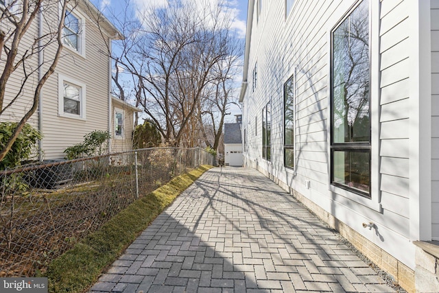 view of patio featuring a garage