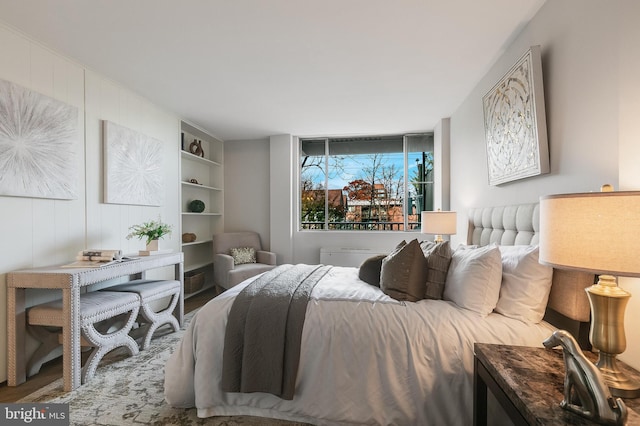 bedroom featuring wood-type flooring