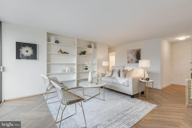 living room featuring light parquet floors