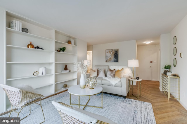 living room featuring light parquet flooring