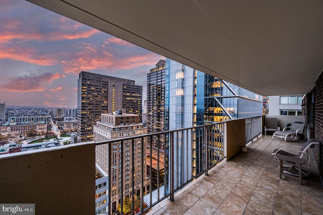 view of balcony at dusk