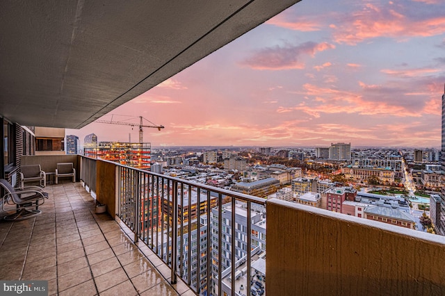 view of balcony at dusk