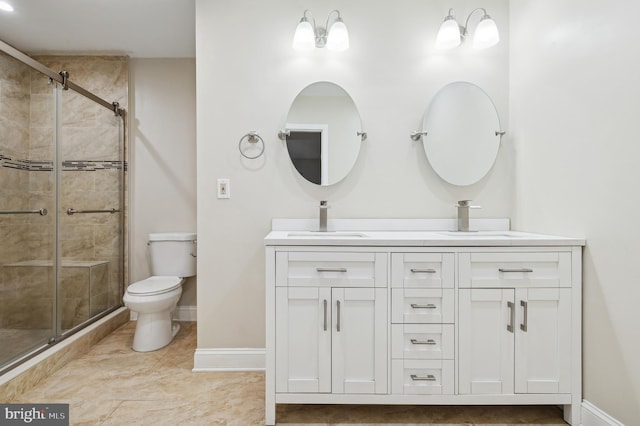 bathroom featuring a shower with door, tile patterned floors, toilet, and vanity