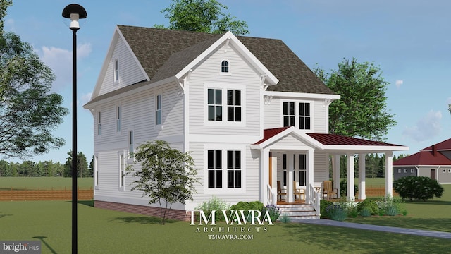 view of front of house with covered porch and a front lawn