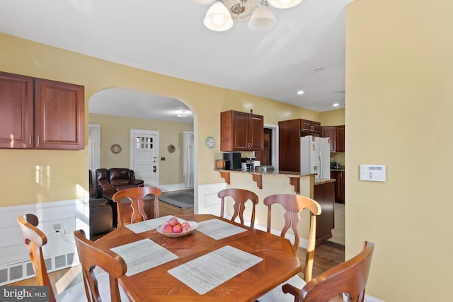 dining room featuring wood-type flooring