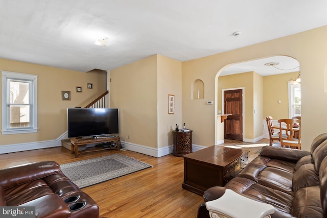 living room with light hardwood / wood-style flooring