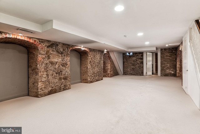 basement with carpet floors