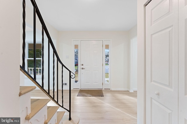 foyer entrance featuring light hardwood / wood-style floors