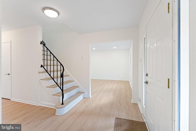 entrance foyer featuring light hardwood / wood-style floors