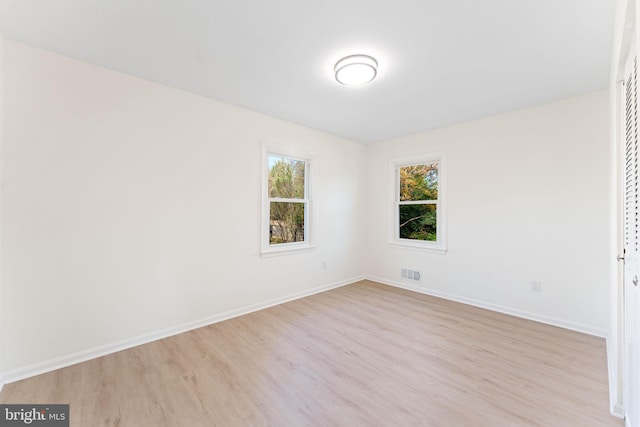 empty room featuring light hardwood / wood-style floors