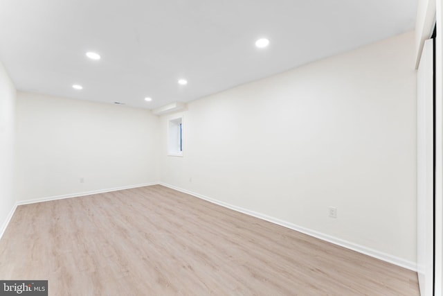 unfurnished room featuring light wood-type flooring