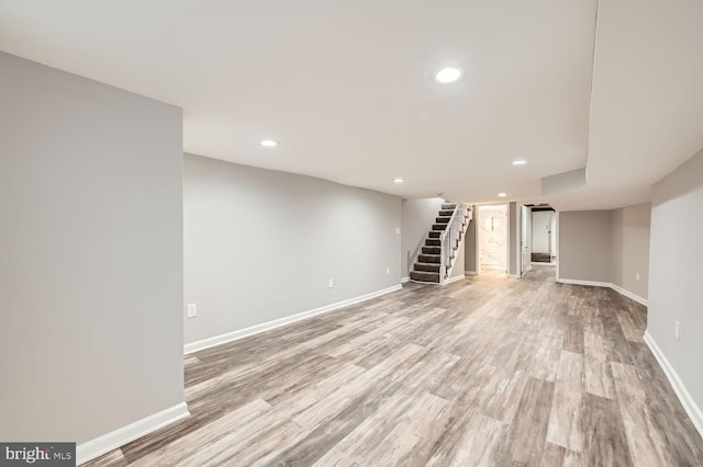 basement featuring light wood-type flooring