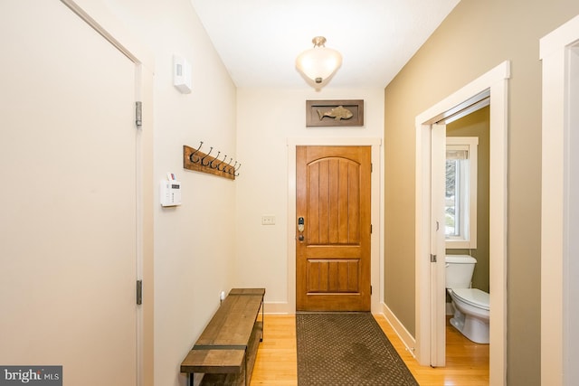 entryway with light hardwood / wood-style floors