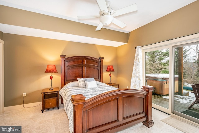 carpeted bedroom with access to outside and ceiling fan