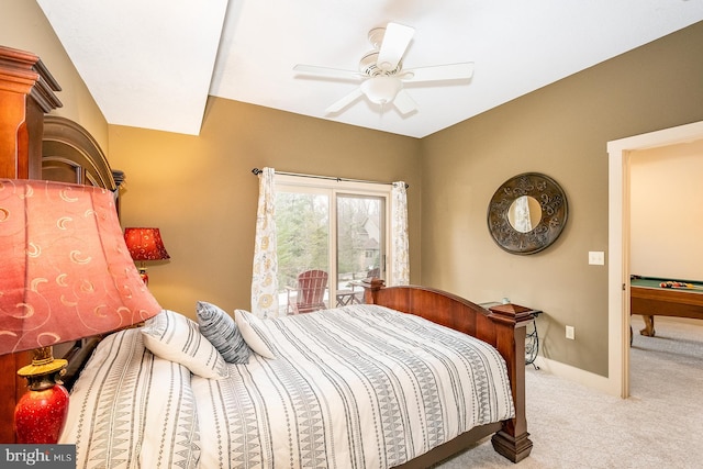 carpeted bedroom featuring ceiling fan and pool table