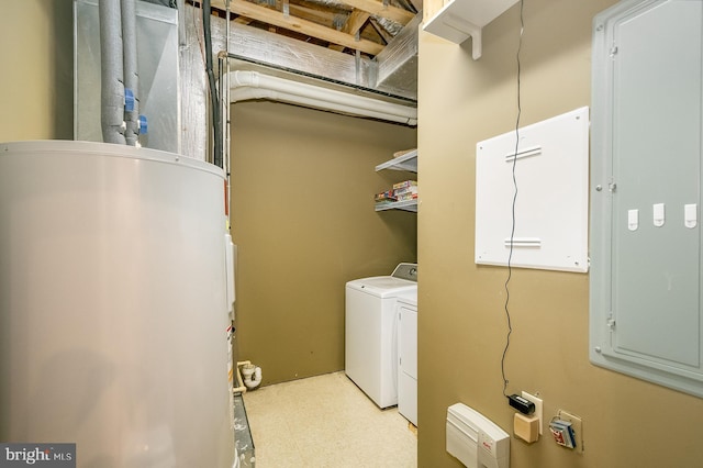 clothes washing area featuring washer and dryer