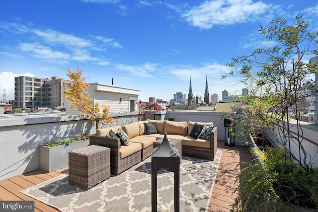view of patio / terrace with outdoor lounge area and a city view