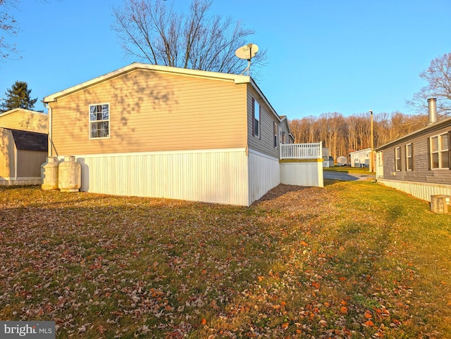 view of home's exterior featuring a yard