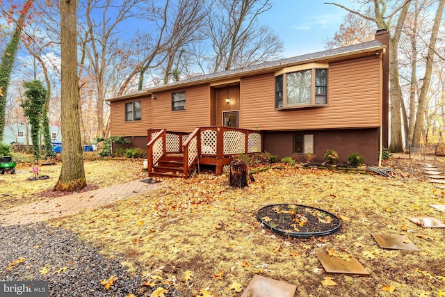 716 Marshall St, Edgewater Park, NJ 08010 - split foyer home featuring a chimney and a deck