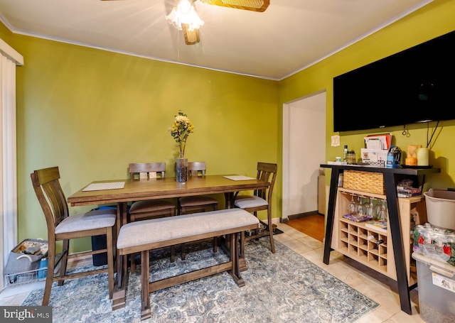 716 Marshall St, Edgewater Park, NJ 08010 - tiled dining space with a ceiling fan and ornamental molding