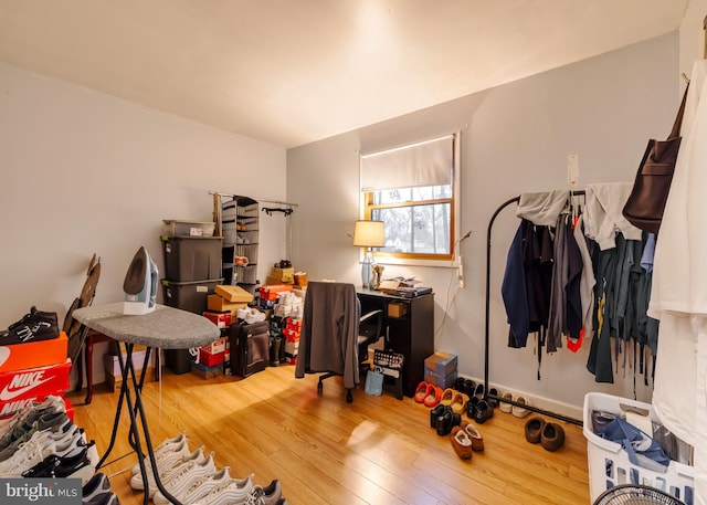 miscellaneous room with wood-type flooring