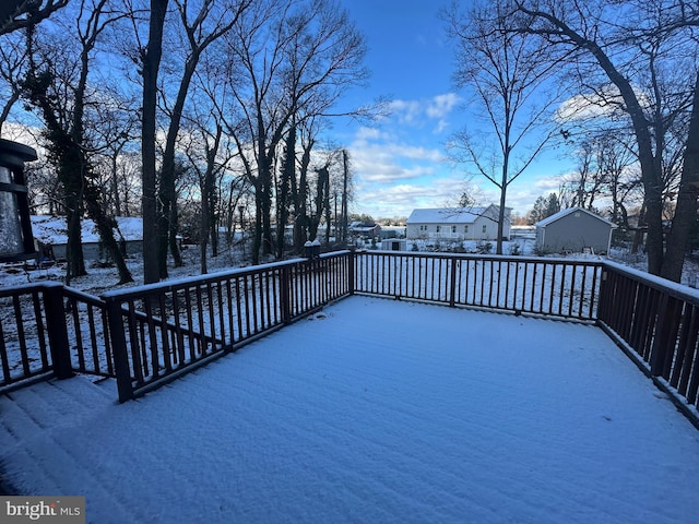 view of snow covered deck