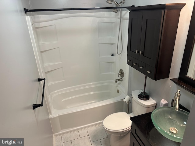 full bathroom featuring tile patterned floors, vanity, toilet, and shower / bath combination