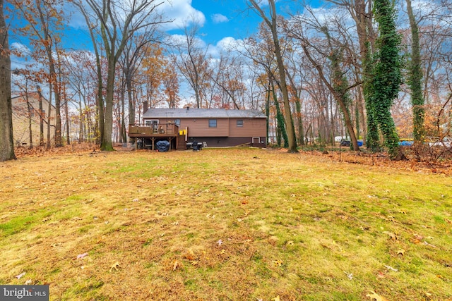 view of yard featuring a deck