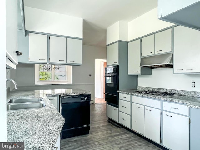 kitchen with black appliances, white cabinetry, sink, and dark wood-type flooring